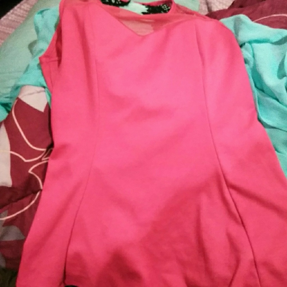 Fushia peplum top.